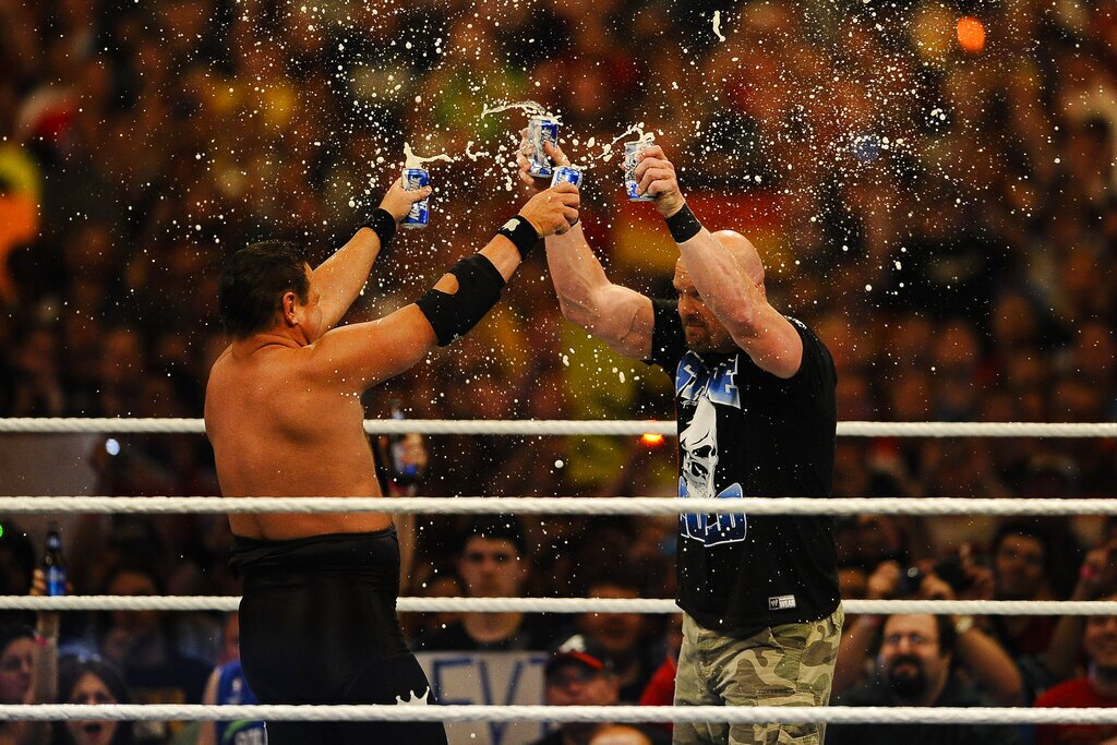 WWE Legends Jerry "The King" Lawler and Stone Cold Steve Austin celebrate during WrestleMania XXVII at the Georgia Dome in Atlanta, Georgia on Sunday, April 3, 2011. (Paul Abell/AP Images for WWE)