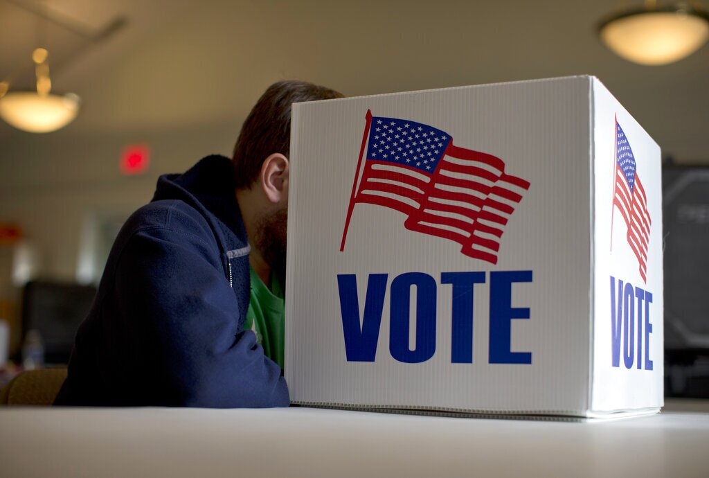 A voter fills our a provisional ballot by hand for the midterm elections at a polling place in Annapolis, Md., Tuesday, Nov. 4, 2014. (AP Photo/Carolyn Kaster)